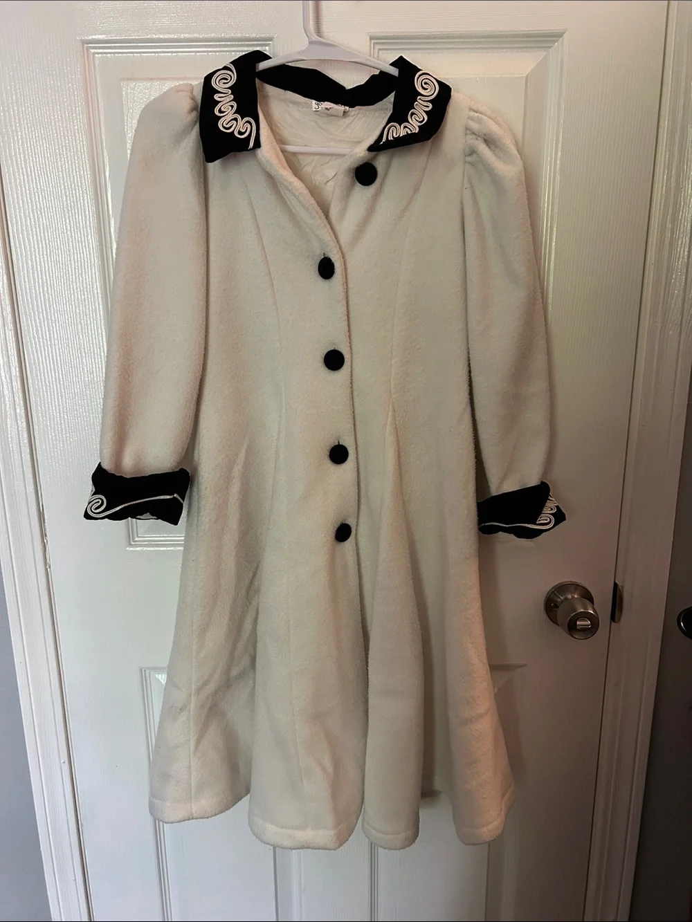 Girls Cream Pea Coat with Black Trim and Embroidered Collar